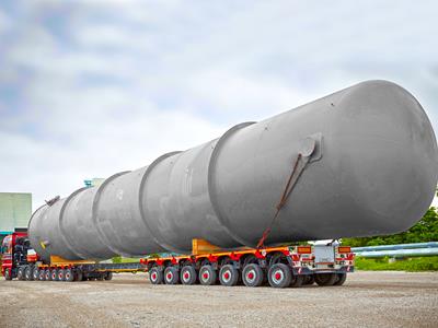 A 12-axle semi-low loader with telescopic add-on beam for the transport of an industrial boiler which weighed 85 tonnes, was 30m long and had a diameter of 5m. With the combination giving a potential payload of over 150 tonnes it was the length of the load which provided the challenge.