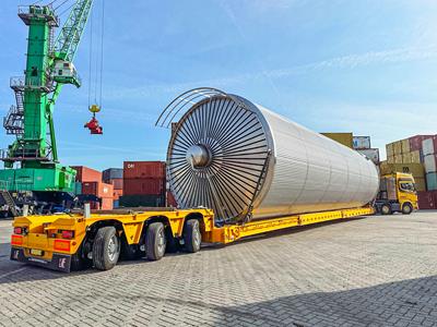 Lowbed trailer with removable gooseneck, lowbed and a bogie with 1-5 axles. If required available with 1 or 2-axle dolly.