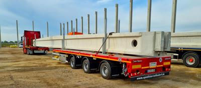 Als er bij Tolksdorf transport van betonnen elementen en binten op de agenda staat, laat deze robuuste plateau-oplegger zijn spierballen weer eens rollen.