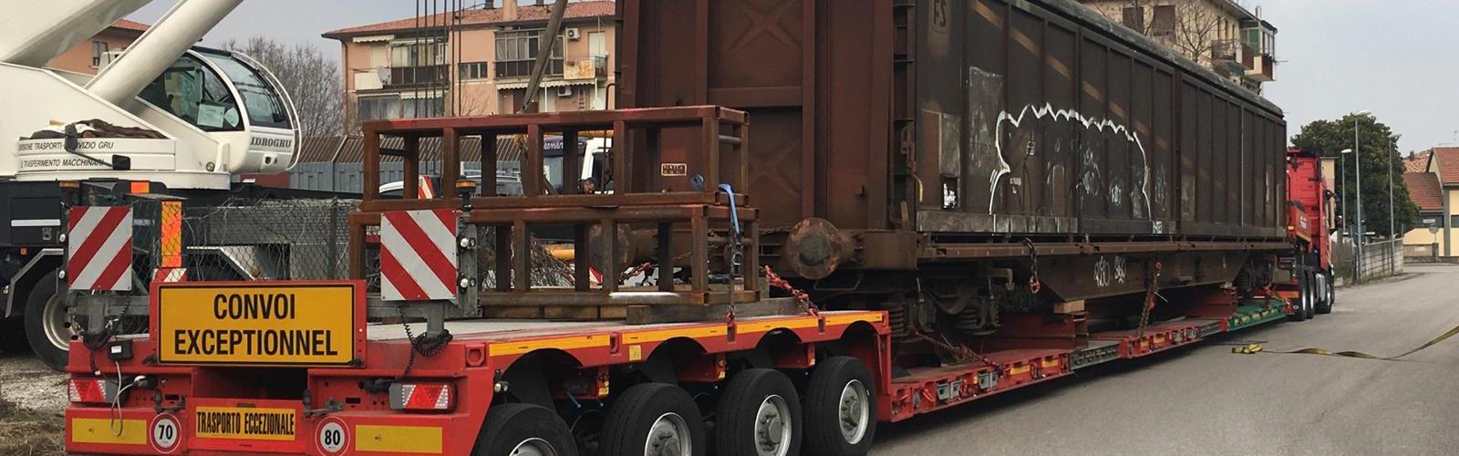 Railway vehicles on lowbed trailers