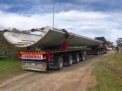 Absolute Wind and one of its flatbed trailers working in South Africa