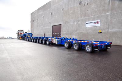 The HighwayMAX-Dolly&Booster is an extendable super heavy haul trailer composed of nine hydraulically steered pendle-axles, a 3-axle jeep dolly and a 3-axle nitro-booster.